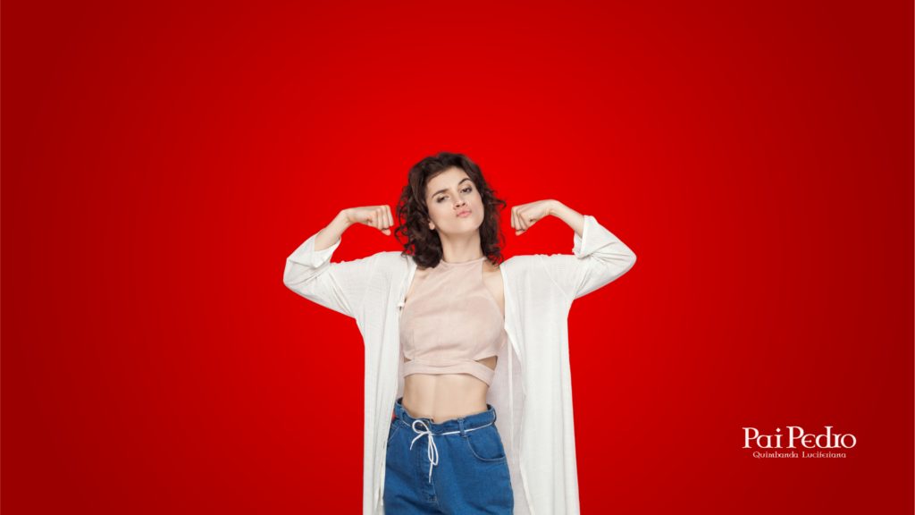 Mulher em pose de força com expressão confiante diante de fundo vermelho, simbolizando superação e poder pessoal após vencer a carência afetiva.