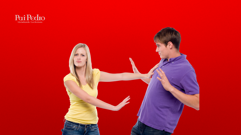 Mulher afasta homem com as mãos, demonstrando atitude firme e expressão de desaprovação, quando ele não te valoriza, sobre fundo vermelho intenso. 