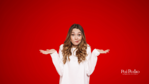 Mulher jovem de expressão confusa com os braços erguidos e as palmas voltadas para cima, como quem diz “não sei” sobre se ficante sério ou embuste. Em um fundo vermelho vibrante. No canto inferior direito, o logo de Pai Pedro – Quimbanda Luciferiana.